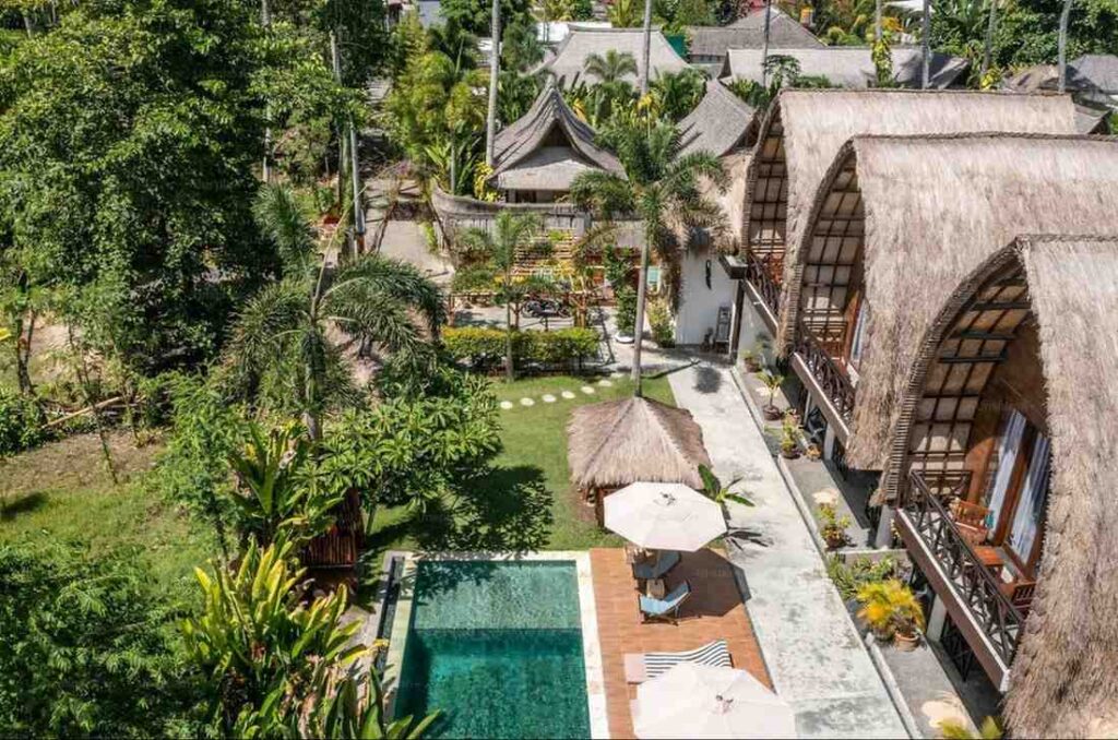 Luxury bamboo villa in Bali surrounded by lush tropical garden